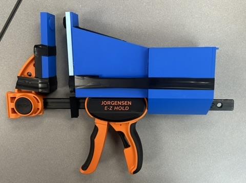Additional view of the printed clamp and casing.